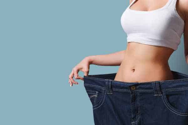 woman after fat reduction treatment Guildford