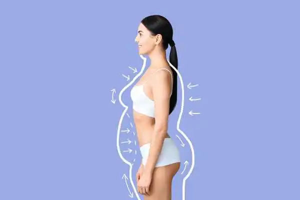 image of woman experiencing fat reduction treatment Guildford