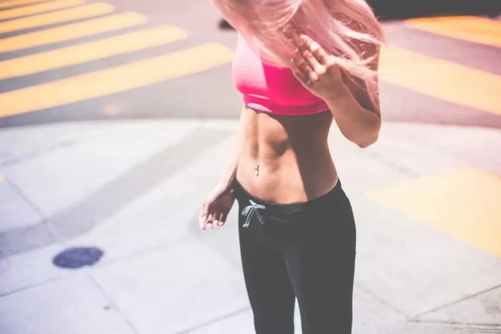 Woman with toned stomach after LA-EMS Body Sculpting Treatment Guildford